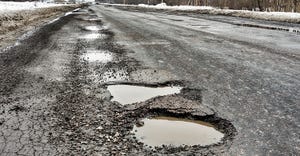 potholes on pavement edges