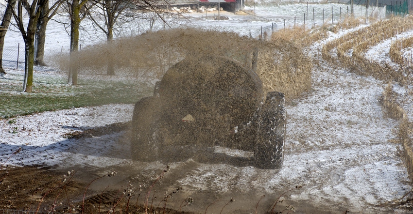 Tractor spreading liquid manure