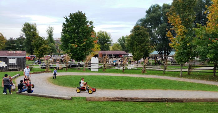 Children pedal their way around Long Acre Farms in Macedon, N.Y.