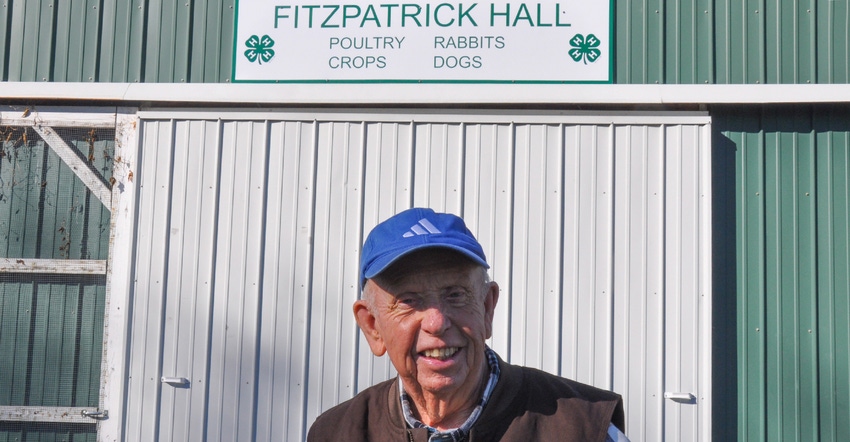 Max Fitzpatrick stands in front of the building that bears his name at the Johnson County 4-H Fairgrounds in Franklin, IN