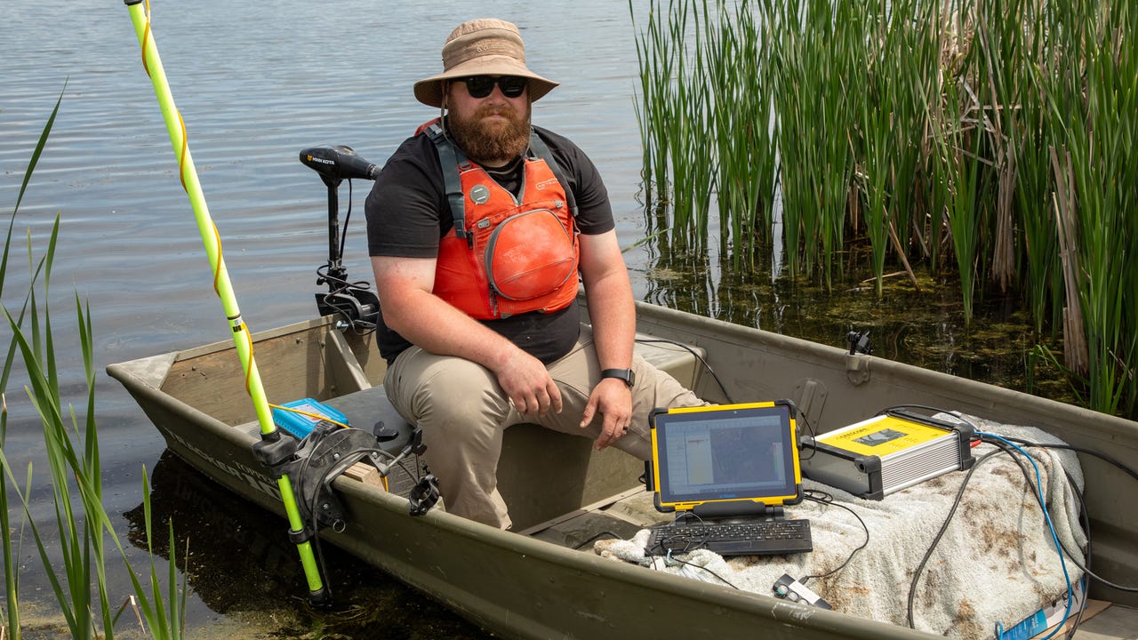 Photos by NRCS - Civil Engineer Technician Hayes Durbin conducts bathymetric survey in Madison County, Iowa