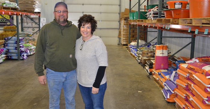 Jason and Heather Misiniec in their feed store