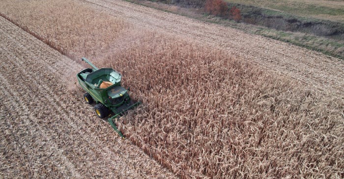 combine going through a field combine going through a field