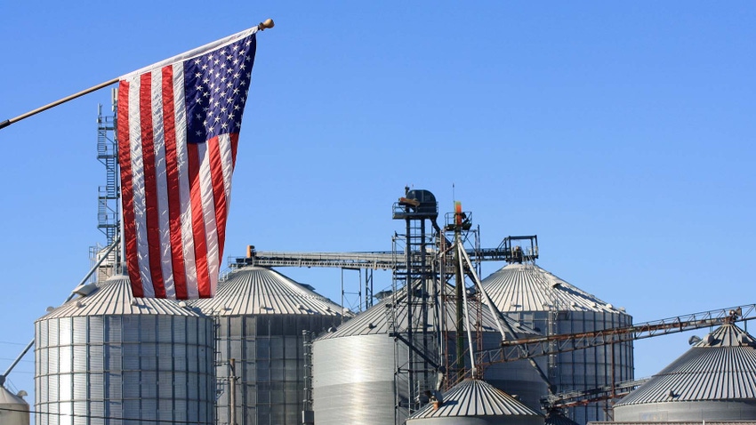 Grain bins with American flag