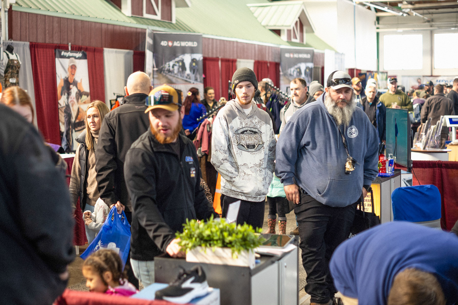 Visitors to the 2025 New York Farm Show check out the latest machinery