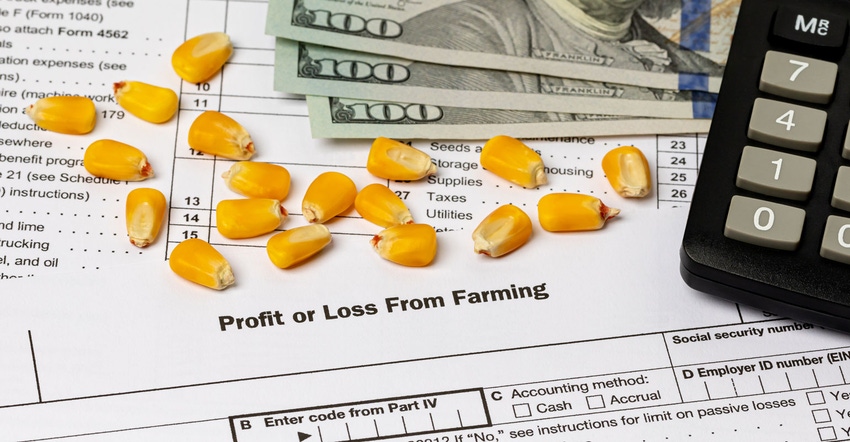 Corn kernels and farm tax form