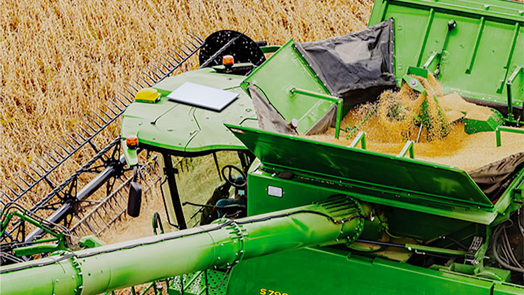 A John Deere combine with satellite connection