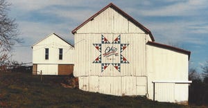 bicentennial barn in Belmont County has been turned into a quilt block barn by painter Scott Hagen