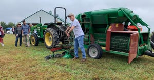 MU’s chestnut champion Michael Gold shares the latest in harvest equipment during the Missouri Chestnut Roast Festival