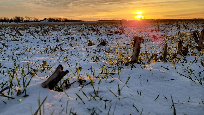 Snow covering crop stubble and cereal rye