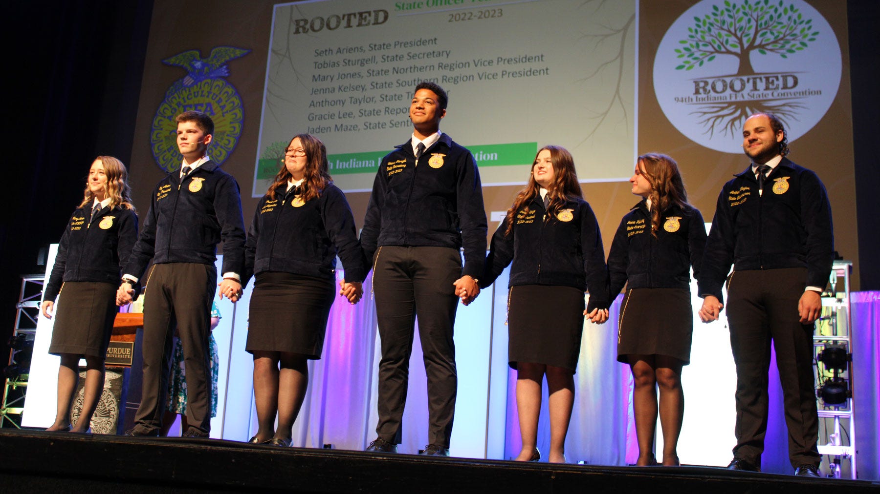 2022-23 Indiana FFA officer team on stage 