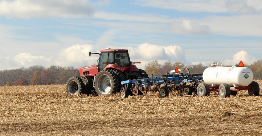 Plowing and fertilizing field