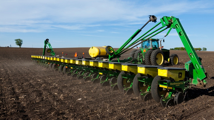 John Deere planter in Minnesota field John Deere planter in Minnesota field