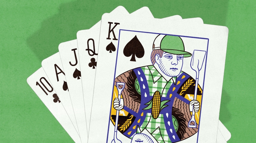 Hand of cards on green background