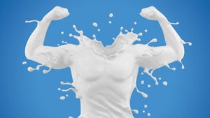 Fitness concept image of a splash of milk in form of muscle man