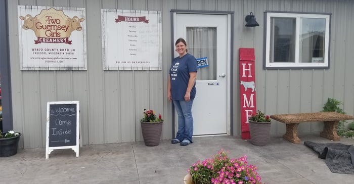 Tammy Fritsch standing in front of her farm store 