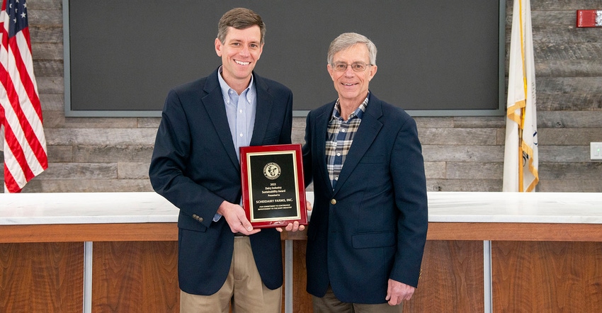 Dan and Doug Scheider receive the Dairy Sustainability Award Dan and Doug Scheider receive the Dairy Sustainability Award