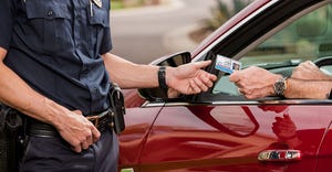 police-checking-license-getty-images-471767080.jpg