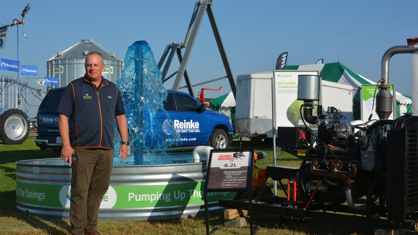 Mike Newland, director of ag business development for PERC, stands by a demonstration exhibit at the PERC booth at Husker Harvest Days