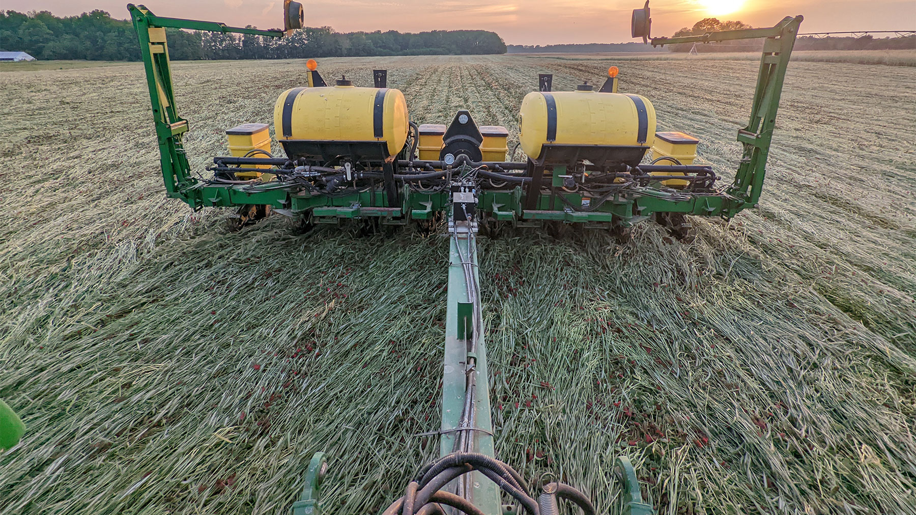 An eight-row John Deere 1760 planter in a field