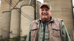 Farmer, Dale Milstead smiles for a photograph