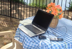 Laptop on back porch table