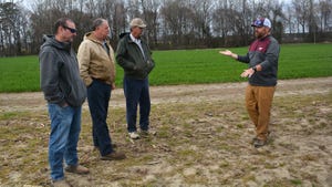 Farmers Ed Joyner, Keith Burgess and Rick Moargan chat with Hunter Frame