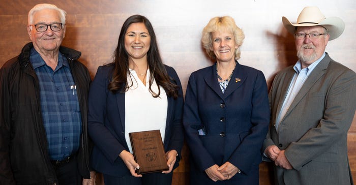 Mai Mueller receives the $1,000, 2021 Frank Baker/Larry Cundiff Beef Improvement Essay Contest award for graduate student 