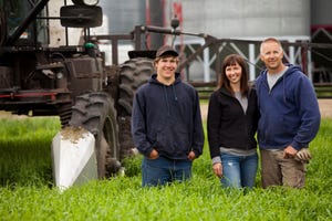 couple-older-son-on-farm-GettyImages-453938671.jpg