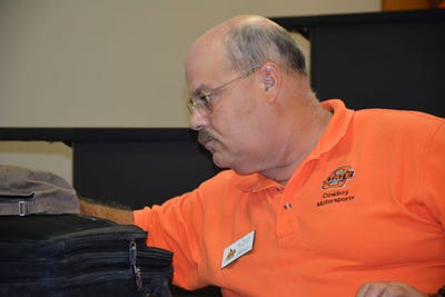 Scott Frazier, associate professor in renewable energy at Oklahoma State University, prepares for his presentation on pumping efficiency at the recent Oklahoma Irrigation conference in Fort Cobb.