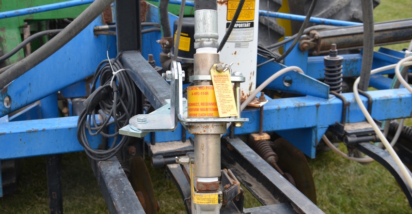close-up of equipment used to sidedress anhydrous ammonia in corn