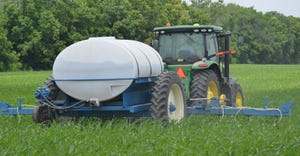 tractor pulling fertilizer tank