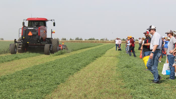 Attendees at the alfalfa plots watching field demonstrations Attendees at the alfalfa plots watching field demonstrations
