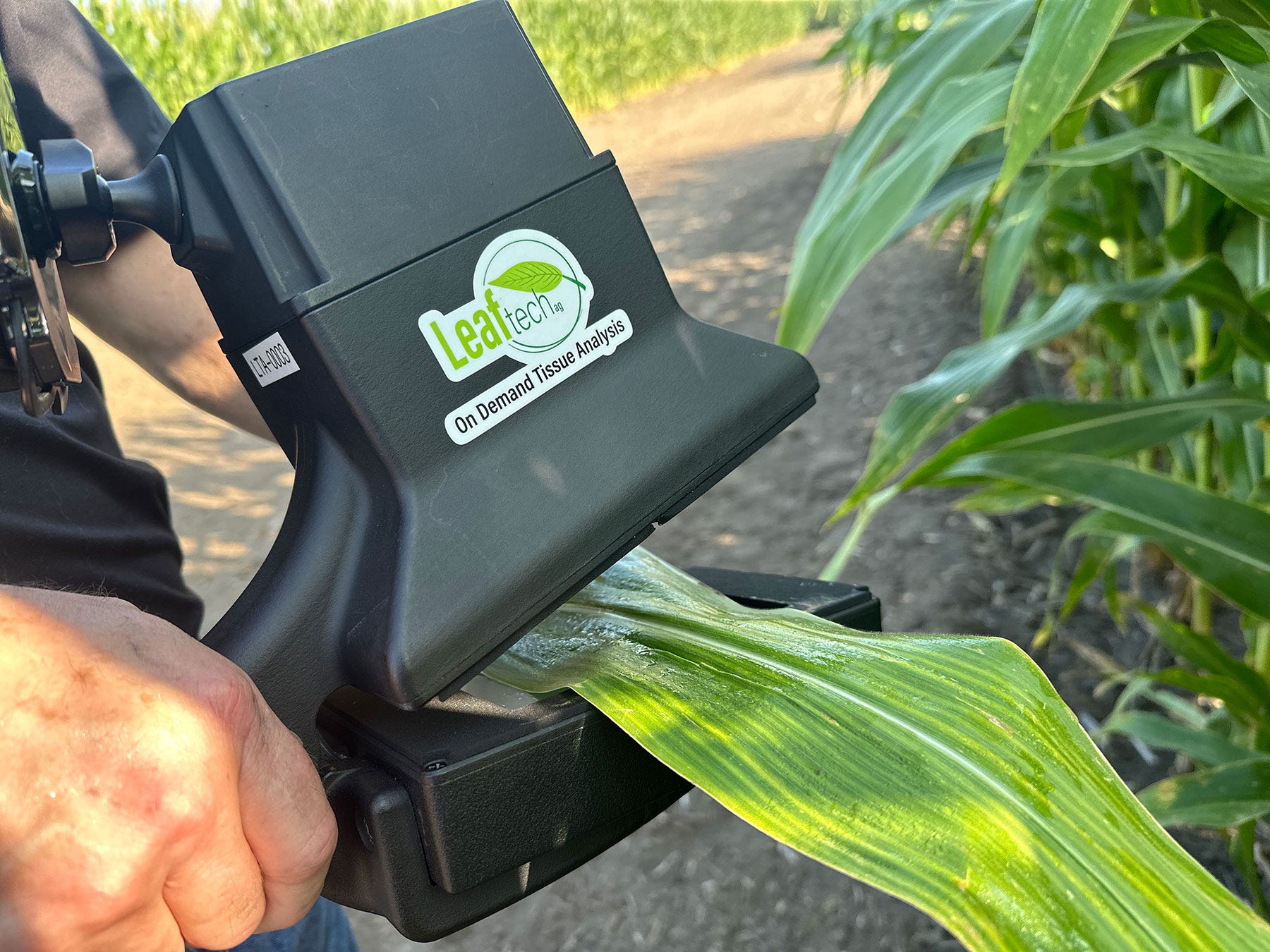 Leaftech Ag tissue testing unit testing a corn leaf Leaftech Ag tissue testing unit testing a corn leaf