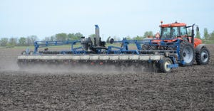 Tractor pulling planter of another brand