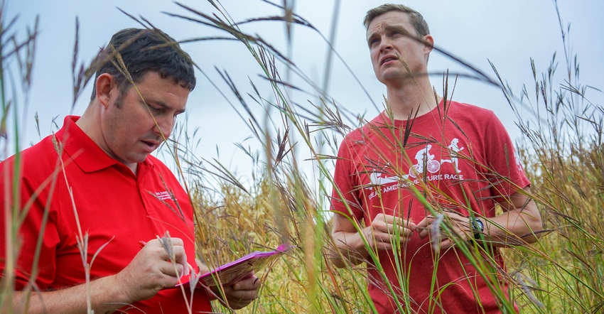 Mark Licht an ISU extension cropping specialist and is evaluating an established vegetation plot with Adam Janke Mark Licht an ISU extension cropping specialist and is evaluating an established vegetation plot with Adam Janke