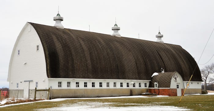 : A view from the west of a barn near Albion, Mich., showing the milk house to the north and the wing off to the south. : A view from the west of a barn near Albion, Mich., showing the milk house to the north and the wing off to the south.