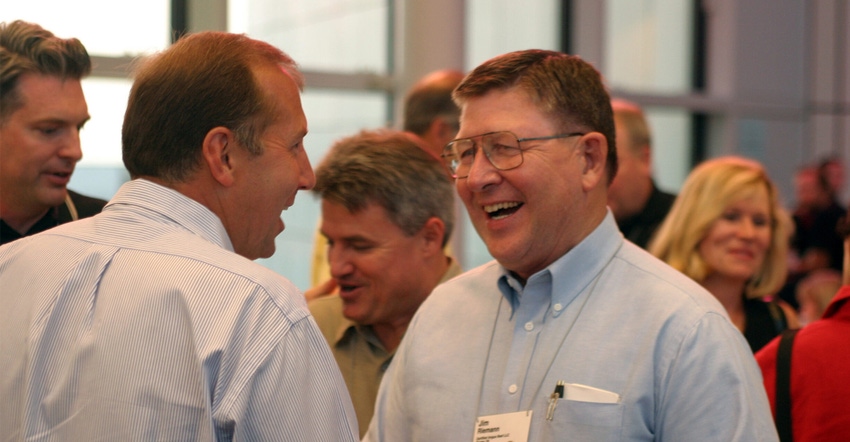 Jim Riemann with a colleague
