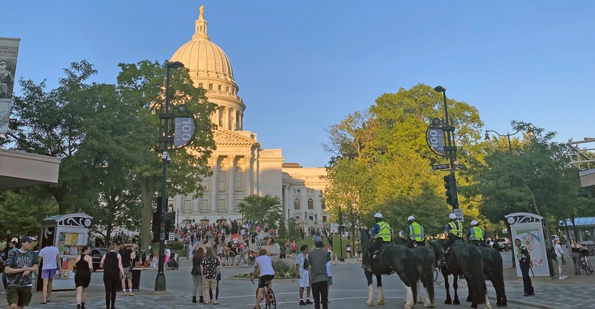 protestors at the Capitol building in Madison, Wis.