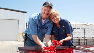 Jim and Robin Seaquist holding cherries