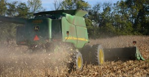 combine harvesting and spreading corn residue