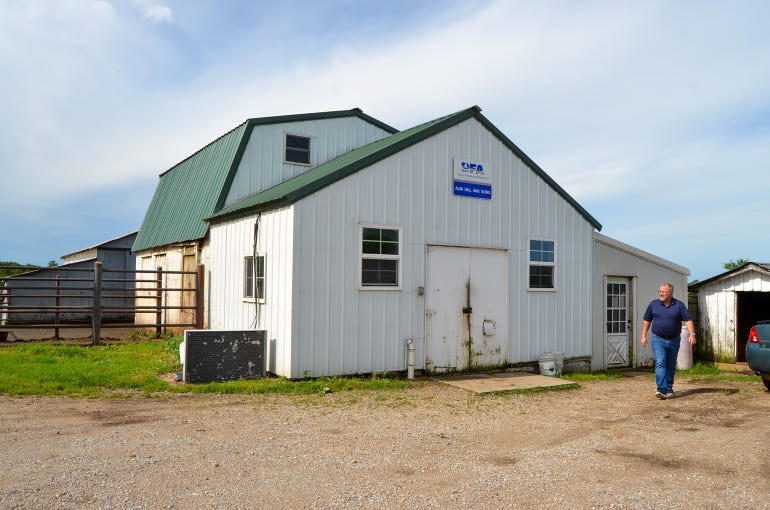 Pictured is the exterior of the milking barn at Alva Dill and Sons Dairy Farm