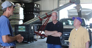 U.S. Senator Jerry Moran and Kansas State University President Richard Linton visit with fifth-generation wheat farmers 