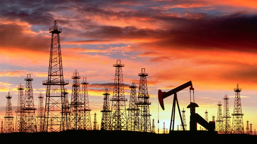 Silhouette of Oil Field at Sunset