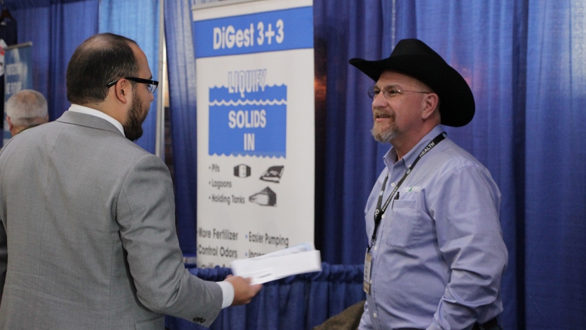 two men at a trade show