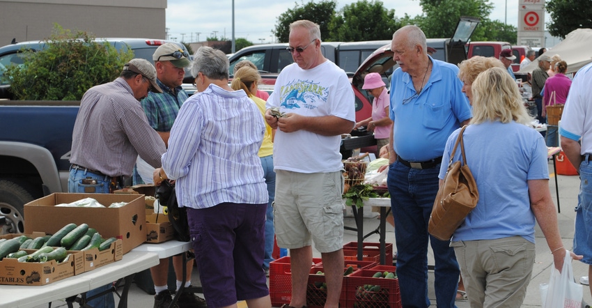 shoppers at a farmer's market