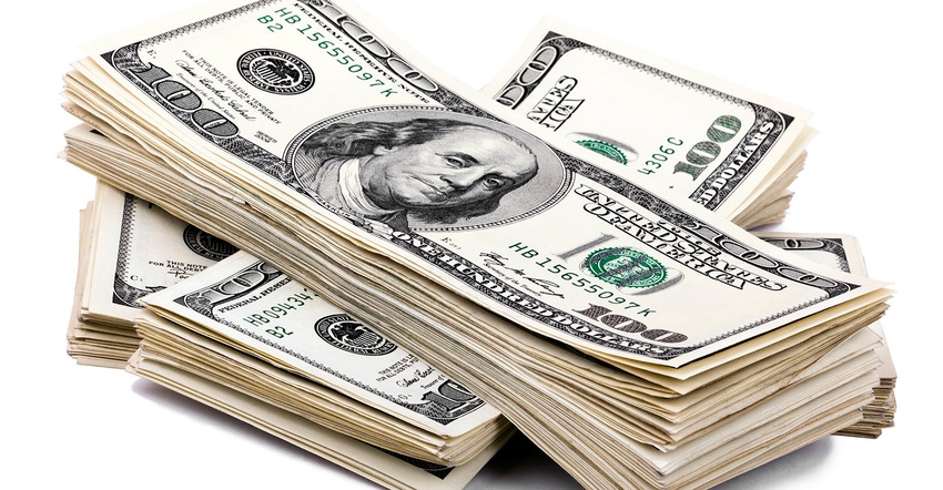 three stacks of US $100 bills on top of each other, isolated on white background three stacks of US $100 bills on top of each other, isolated on white background