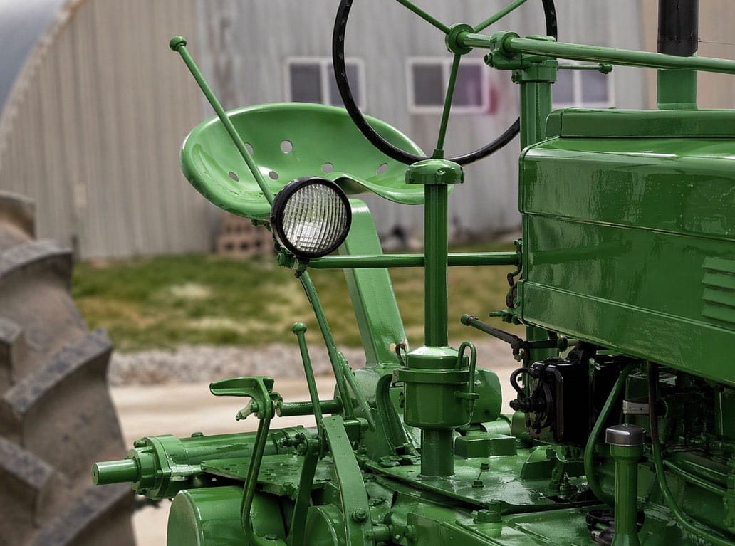 The extended hand clutch rod became this 1946 John Deere GM's identifying feature The extended hand clutch rod became this 1946 John Deere GM's identifying feature