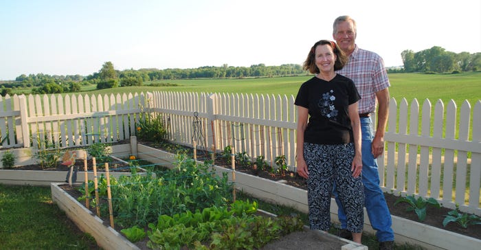 Norine and Terry Zimdars standing in their garden Norine and Terry Zimdars standing in their garden