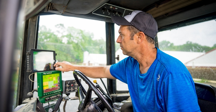 Aaron Thompson prepares his precision mapping technology to variably apply nutrients